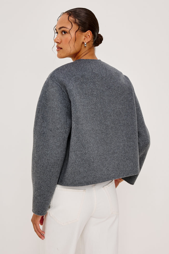 Ronda Jacket in Heavy Wool Blend With Boxy Wrap Style Design, Front Molded Metallic Button Closure, Long Sleeves, and is Unlined in Heater Charcoal Colorway - Upper Body Back View Featured on Model