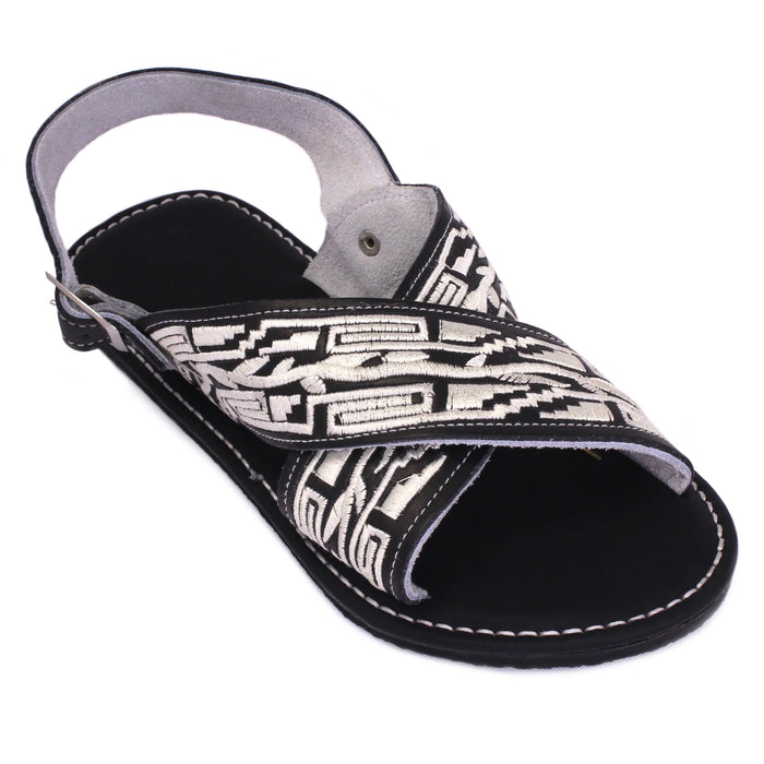 Handcrafted artisan Mexican black  with white stitching genuine leather huarache sandals featuring wide crossover leather straps, adjustable heel strap, open-toe design, and durable rubber outsole for everyday comfort.
