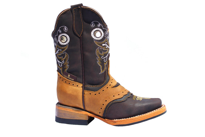 Side view of a black and honey leather boots with a bull head cut out and yellow and white embroidery