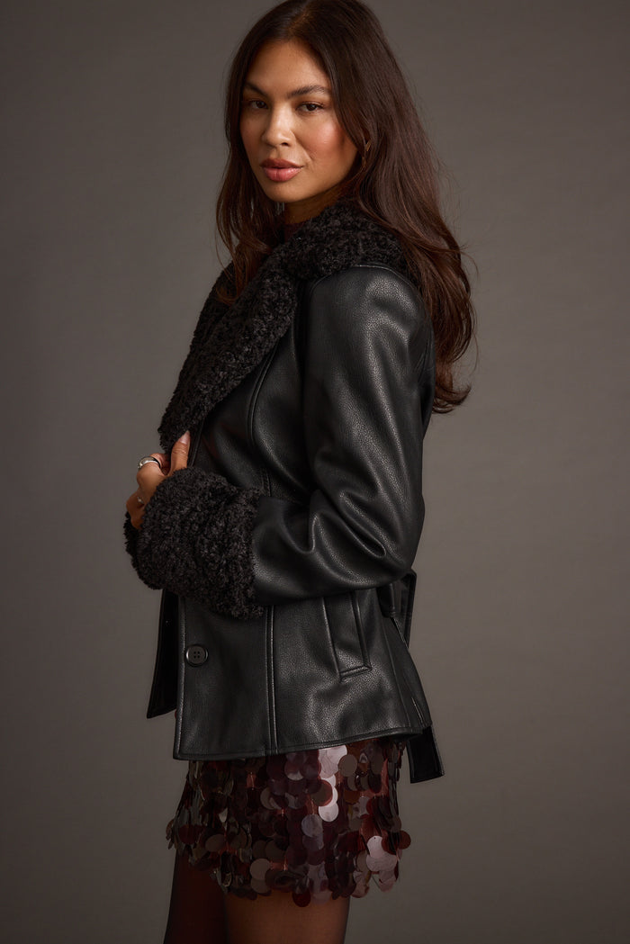 Detail shot of the Banks Black Belted Coat highlighting the design elements.