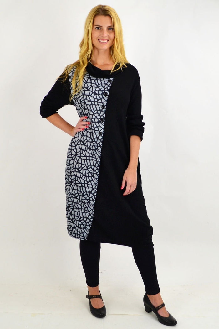 Black Whispers warm winter tunic dress with long sleeves and cozy fabric, styled for a comfortable, casual look.