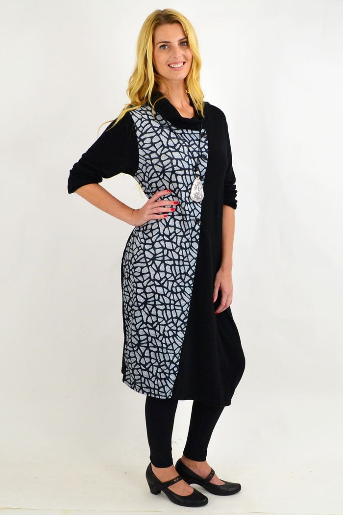 Black Whispers winter tunic dress with long sleeves and a relaxed fit, perfect for warm winter style.