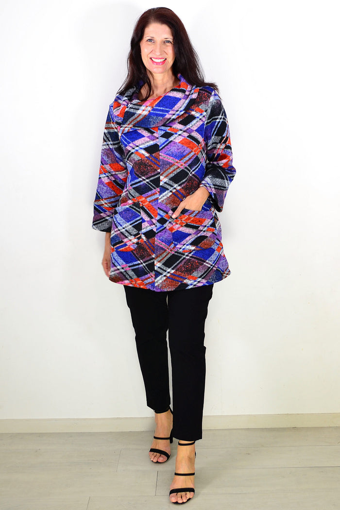 Blue and red geometric-patterned winter tunic top by Wishstone, featuring long sleeves and a cozy fit.