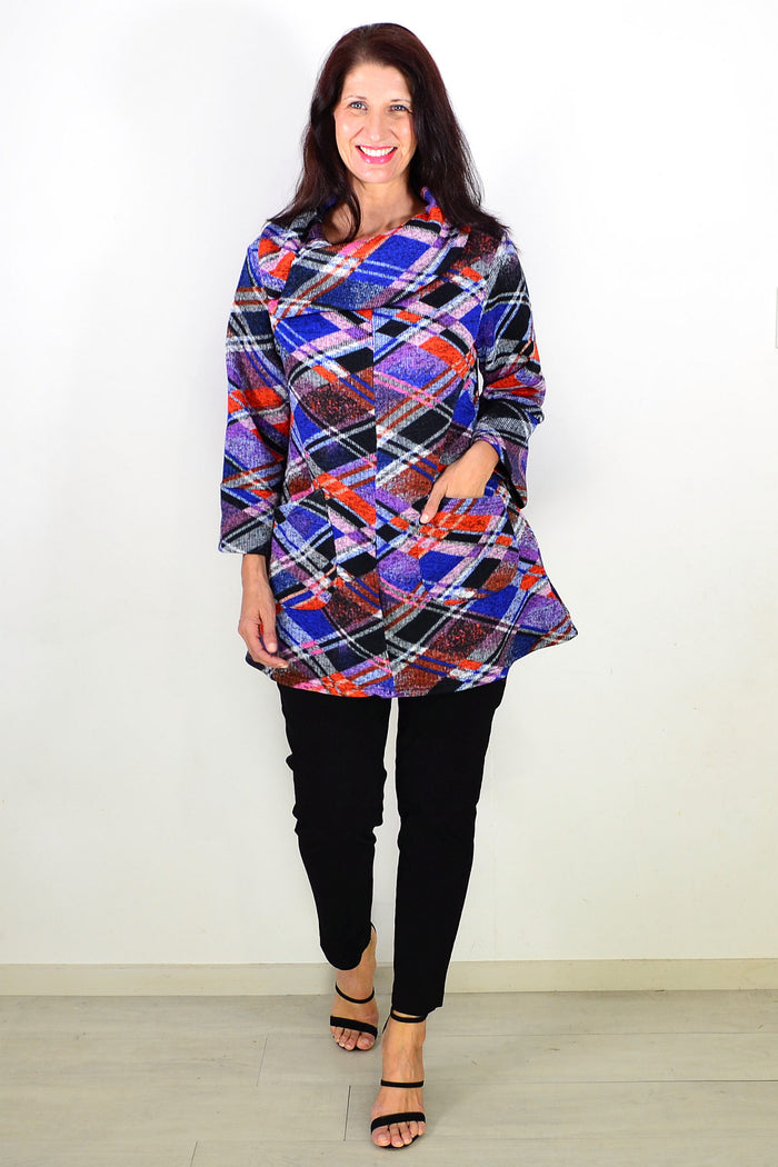 Blue and red geometric winter tunic top by Wishstone, featuring a stylish pattern and cozy fabric ideal for cold weather.