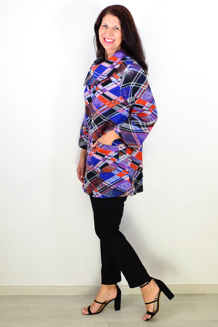 Blue and red geometric winter tunic top by Wishstone, featuring long sleeves and a stylish pattern perfect for cold weather.