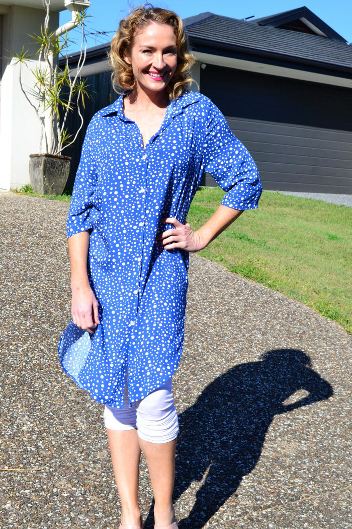 Blue and white spot long tunic shirt by Hourglass, featuring a relaxed fit and stylish design, displayed on a hanger.