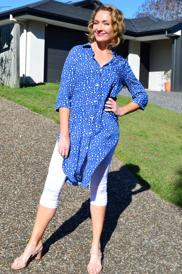 Blue and white spot long shirt tunic by Hourglass, flowing fabric with a relaxed fit and button-front design.