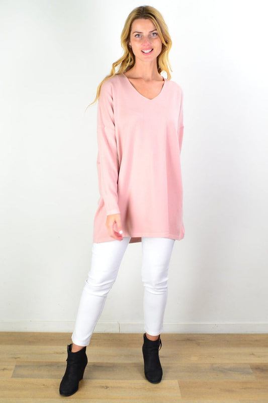 Blush pink wool blend fine knit tunic top by Cali&Co, featuring a cozy, relaxed fit with long sleeves and a round neckline.