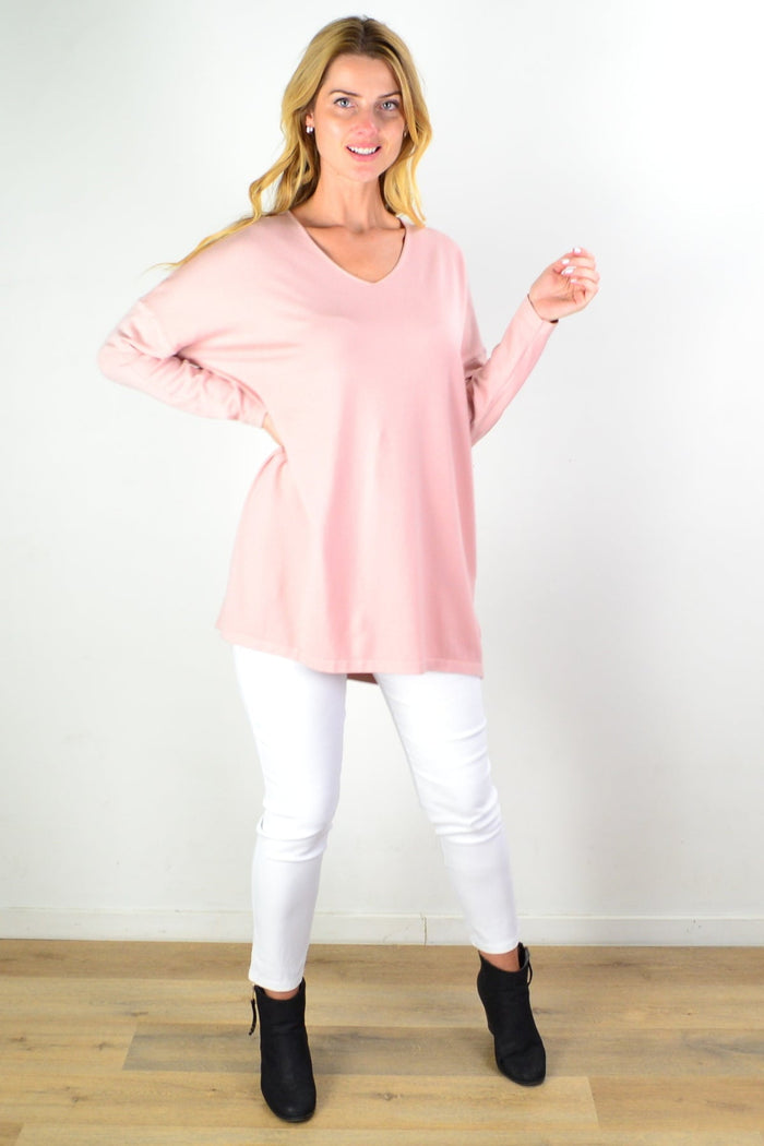 Blush pink wool blend fine knit tunic top by Cali&Co, featuring a relaxed fit and textured fabric, displayed on a neutral background.
