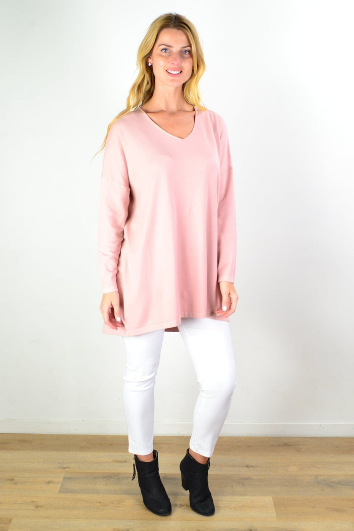 Blush pink wool blend fine knit tunic top by Cali&Co, featuring a cozy, fitted design and long sleeves.