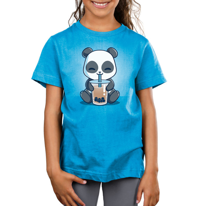 Premium Cotton T-shirt_TeeTurtle cobalt blue Boba Panda apparel featuring a panda sitting and happily drinking bubble tea with a straw from a large cup.