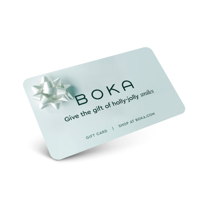 Light blue Boka E-Gift Card with a silver bow—spread smiles with gifts from boka.com.