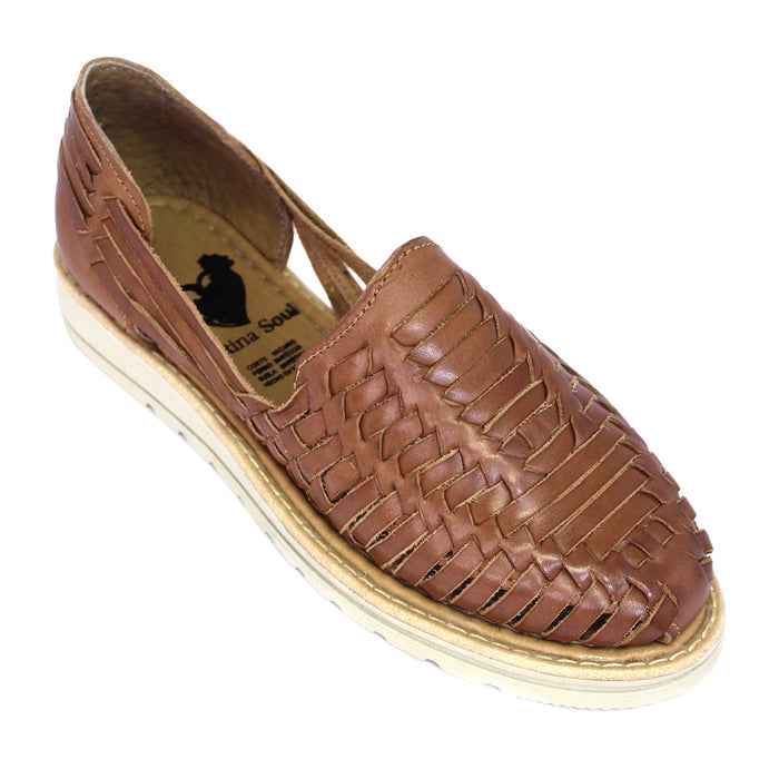 Women’s brown woven leather Mexican huarache sandals with closed toe and light-colored sole