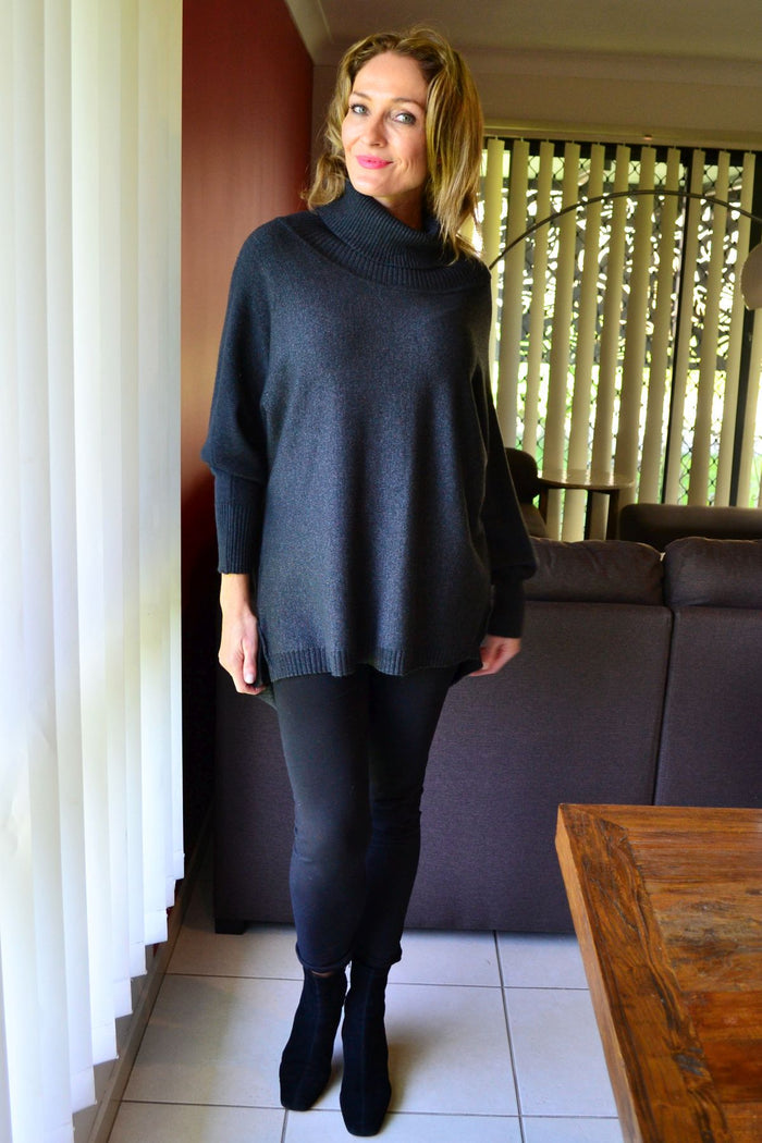 Charcoal grey Whishstone Snuggle Up Tunic Jumper displayed on a hanger, showcasing its cozy, relaxed fit and soft fabric.