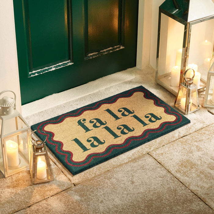 Christmas Fa La La La La Coir Doormat-. Made from eco-friendly materials featuirng a graphic design.
