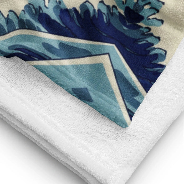 Cookie Wave Beach Towel - The substitution of jagged sea foam with a chaotic hand clutching photorealistic chocolate chip cookies, paired with the erratically placed googly eyes on the Prussian blue wave (#2A3B55) and lighter distressed denim tones (#7698B3), all set against a warm parchment beige background (#E6D8BD).