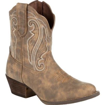 Brown cowboy boot with intricate white stitching on a white background