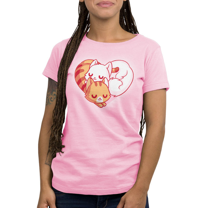 Premium Cotton T-shirt_TeeTurtle light pink Cuddling Kitties apparel featuring two cats snuggling together, forming a heart shape with their bodies and tails.