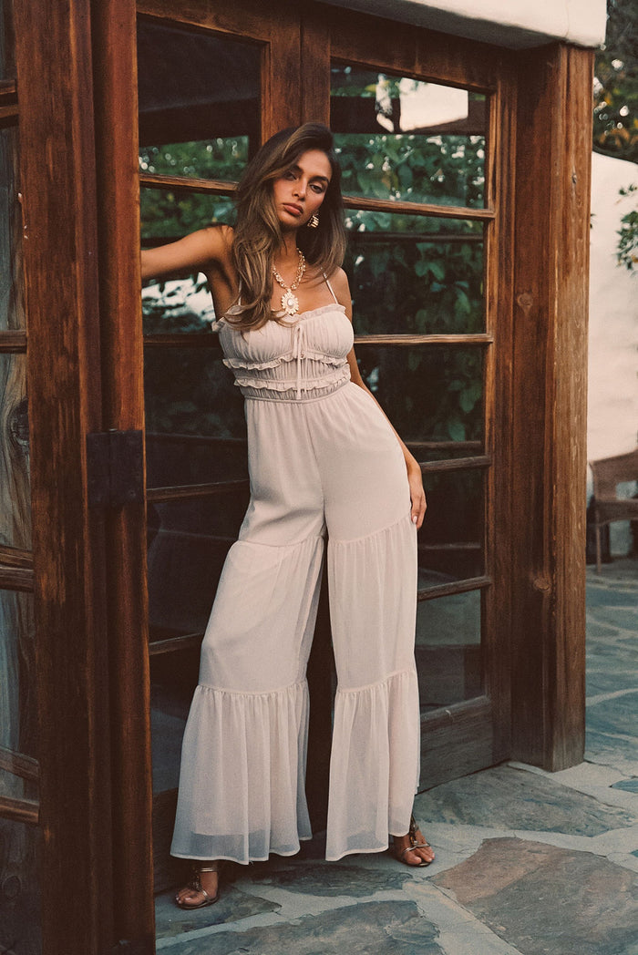 Close-up of the Dahlia Blush Chiffon Jumpsuit showcasing the chiffon texture and craftsmanship.