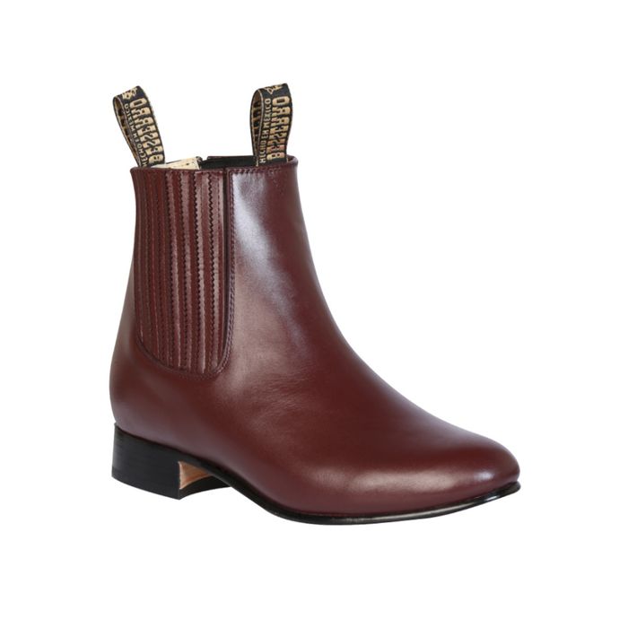 wine leather short western ankle boot with elastic side panels and low heel.