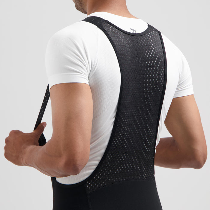 Detail van Rogelli Essential II lange fietsbroek heren zwart bretels achterkant.
