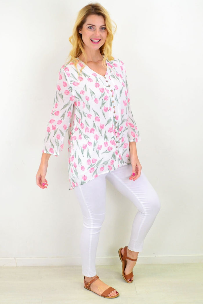 Floral spring tulip button-up sleeve tunic blouse by Caroline Morgan with a relaxed fit and vibrant blossom pattern.