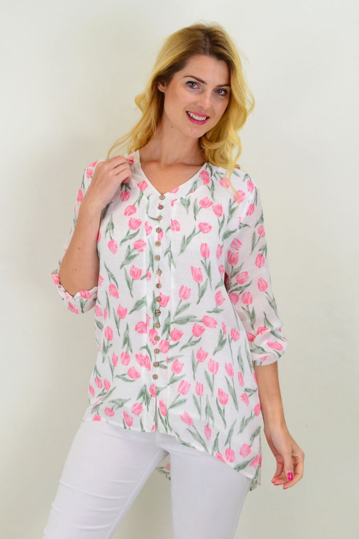 White floral tulip button-up sleeve tunic blouse by Caroline Morgan, featuring a relaxed fit and elegant floral pattern.