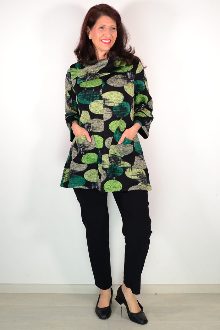 Wishstone green spots winter tunic top featuring a cozy fabric and stylish pattern, designed for comfortable winter wear.