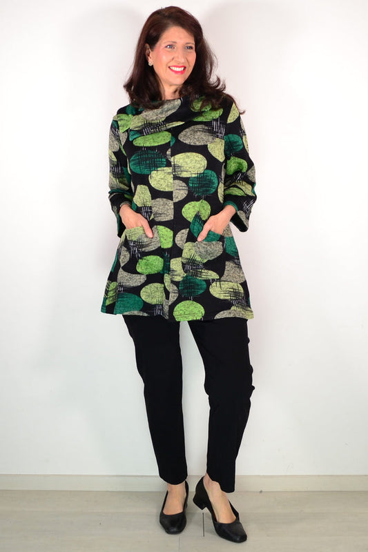 Wishstone green spots winter tunic top featuring a cozy fabric and stylish pattern, designed for comfortable winter wear.