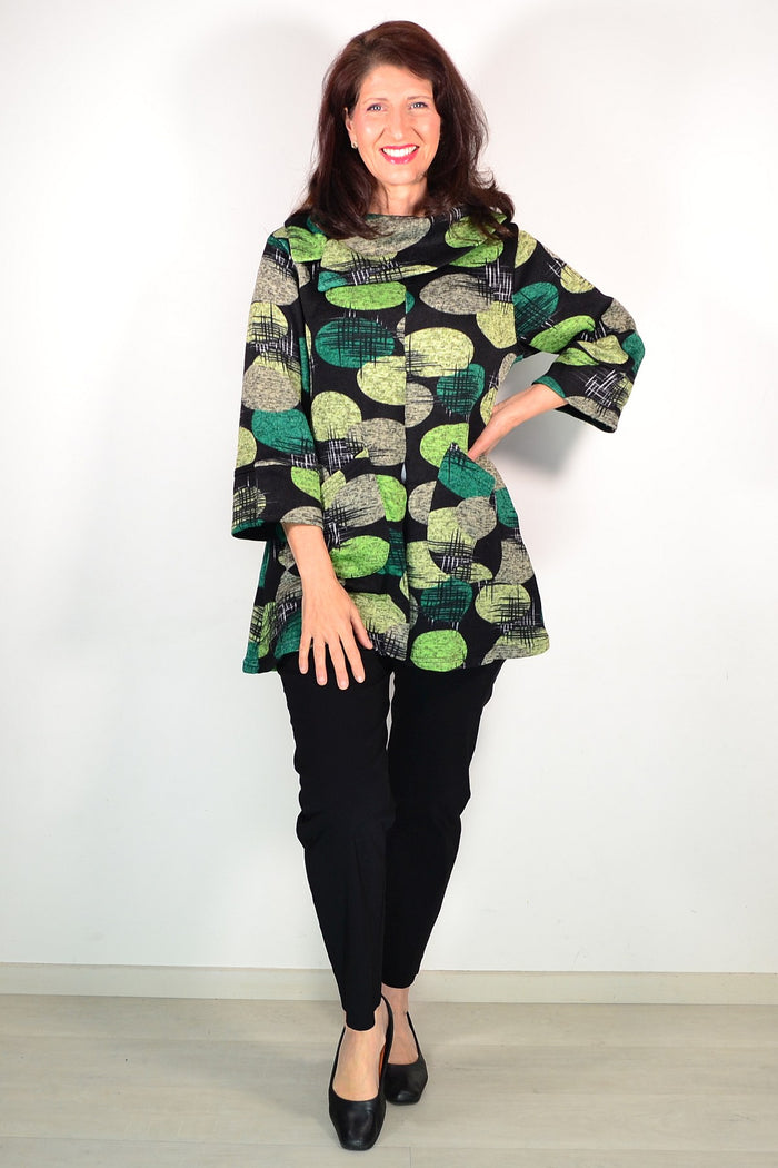 Green Spots Winter Tunic Top by Wishstone featuring a cozy, patterned design and long sleeves, perfect for cold weather.