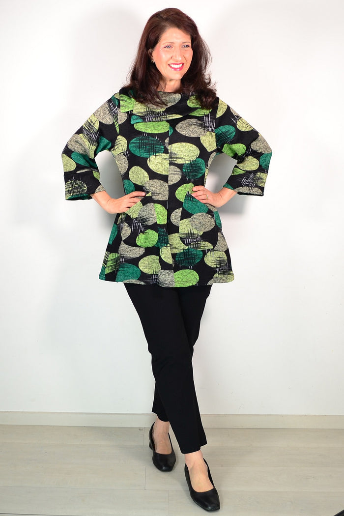 Wishstone Green Spots Winter Tunic Top featuring a vibrant green spotted pattern and cozy fabric, ideal for cold weather wear.