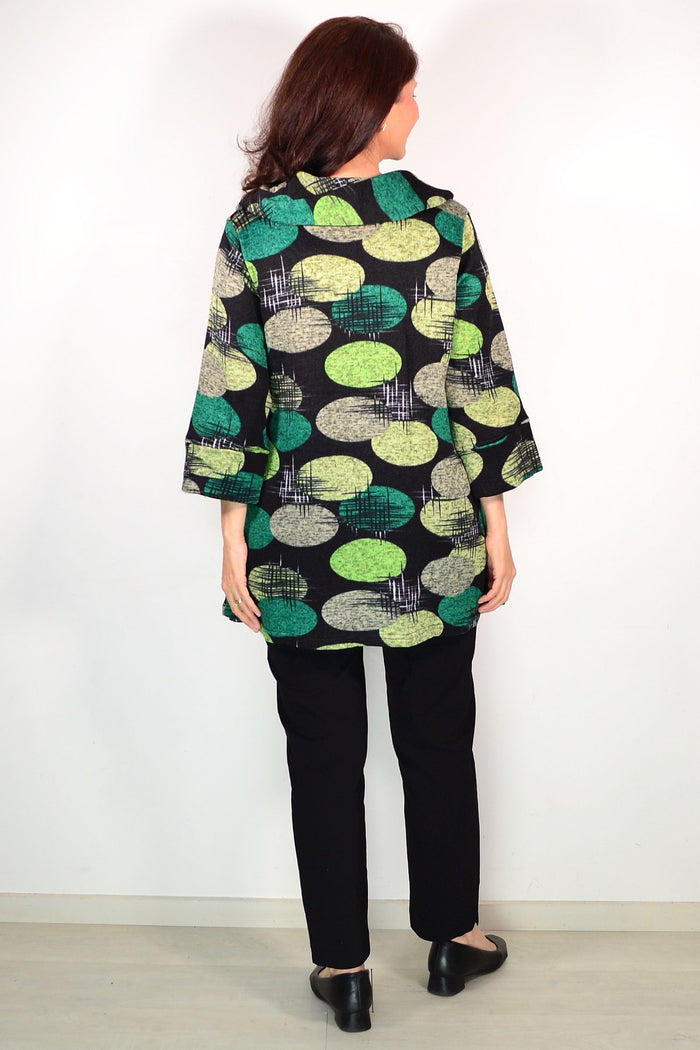 Wishstone Green Spots winter tunic top with long sleeves and a relaxed fit, featuring a vibrant green spot pattern.