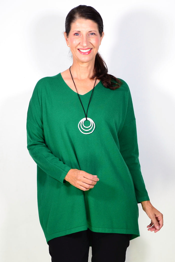 Green wool blend fine knit tunic top by Cali&Co, featuring a close-up of the textured fabric and relaxed fit style.