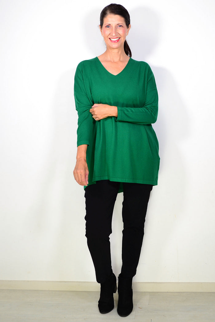 Green wool blend fine knit tunic top by Cali&Co, featuring a close-up of the soft, textured fabric and classic tunic style.