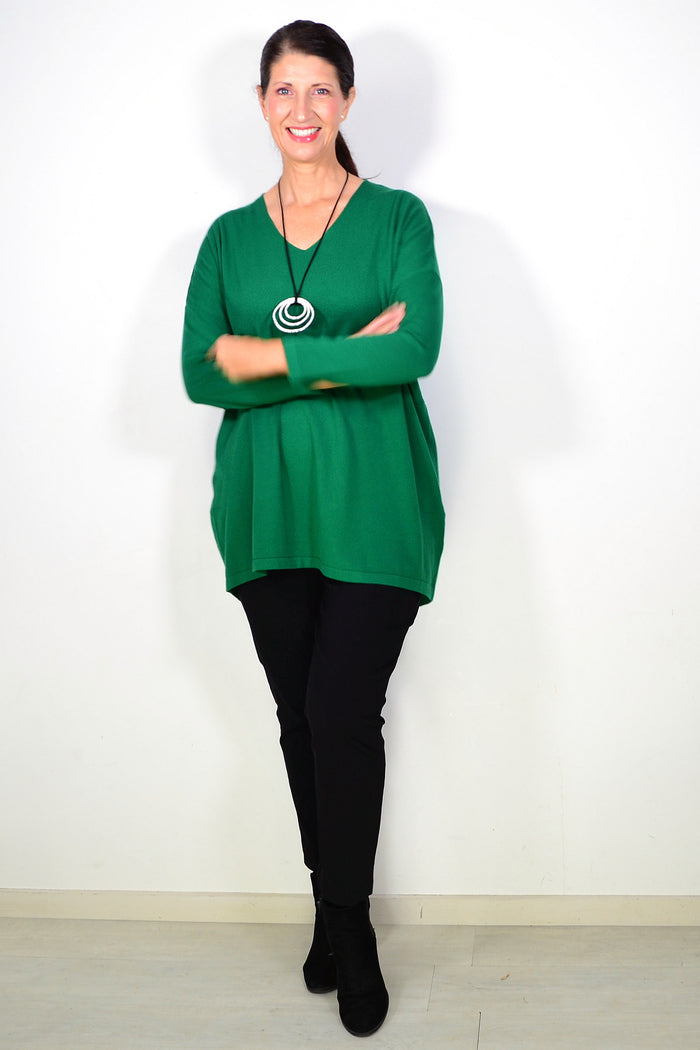 Green wool blend fine knit tunic top by Cali&Co, featuring a close-up of the textured fabric and relaxed fit.
