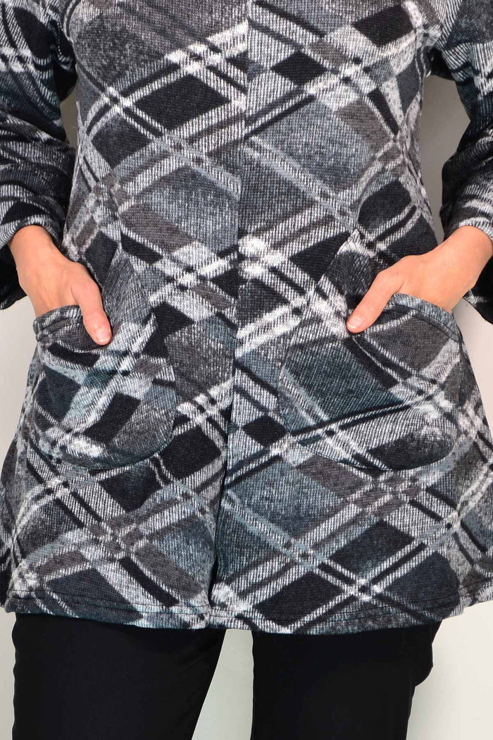Grey squares winter tunic top by Wishstone, featuring a cozy knit design and relaxed fit, displayed on a hanger.