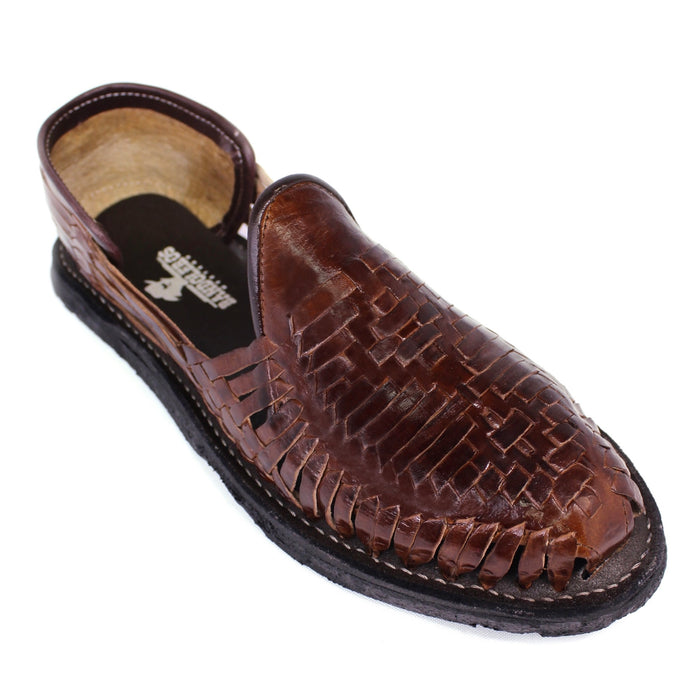 Men's handmade brown genuine leather huarache sandals featuring traditional woven Mexican craftsmanship, closed-toe slip-on design, leather-lined interior, cushioned footbed, and durable flexible outsole for everyday comfort.