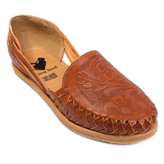 Women's handmade  brown genuine leather huarache sandals featuring an embossed floral design, woven leather detailing, closed-toe silhouette, and lightweight artisan craftsmanship made in Mexico.