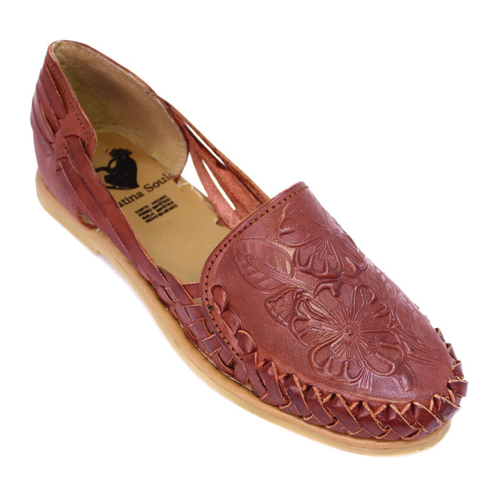 Women's handmade rustic brown genuine leather huarache sandals featuring an embossed floral design, woven leather detailing, closed-toe silhouette, and lightweight artisan craftsmanship made in Mexico.