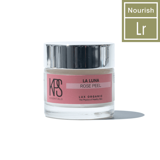 Jar of La Luna Rose Peel | Kindness Powered Skincare with pink label and silver lid, placed on white background with shadow and a small graphic reading Nourish Lr.