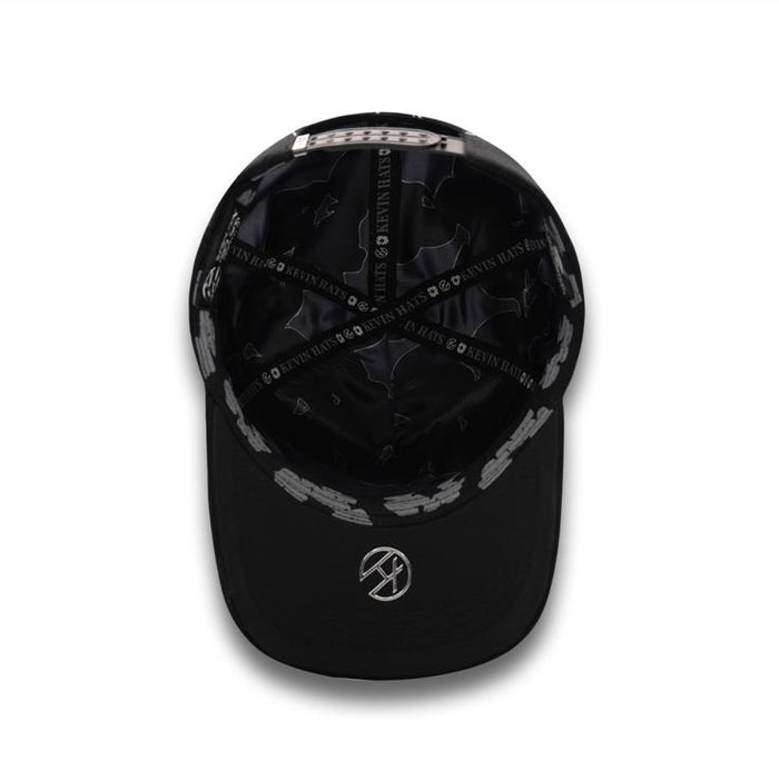 LA NUVES Black Cap – inside view showing custom logo taping and brim embroidery