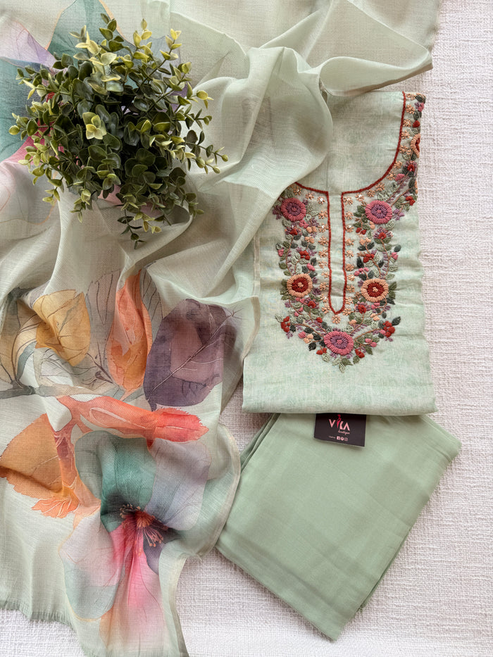 Light green neck emb suit material