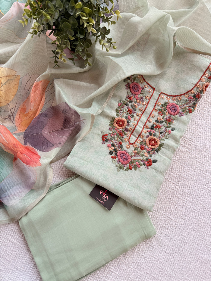 Light green neck emb suit material