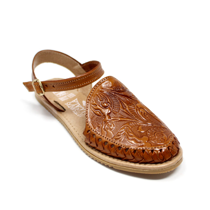 Women's handmade genuine leather artisan huarache sandals featuring a woven leather upper, adjustable ankle buckle strap, cushioned leather footbed, and durable rubber outsole, handcrafted in Mexico for everyday comfort and style.