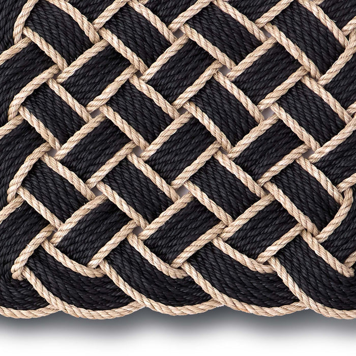 Lovers Knot black outdoor mat- featuring a rope design.