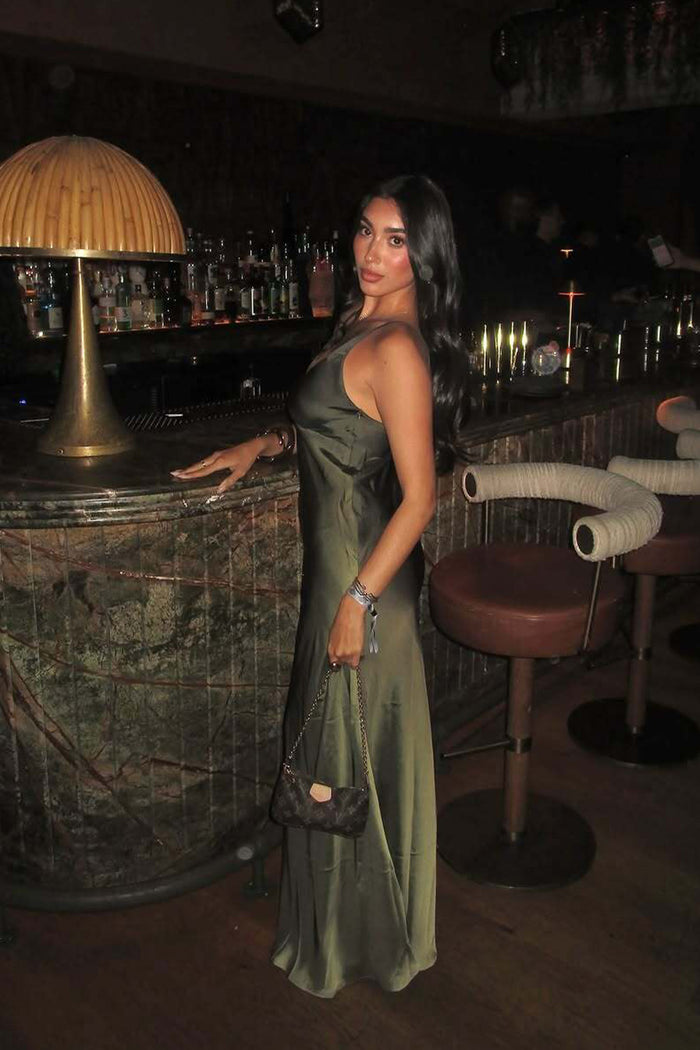 Mirabella Olive Satin Ombre Maxi Dress shown in a complementary styling arrangement.