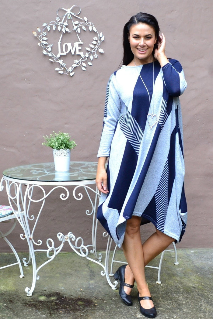 Navy line long tunic dress by Peony featuring a relaxed fit, side slits, and a flowing silhouette on a model.