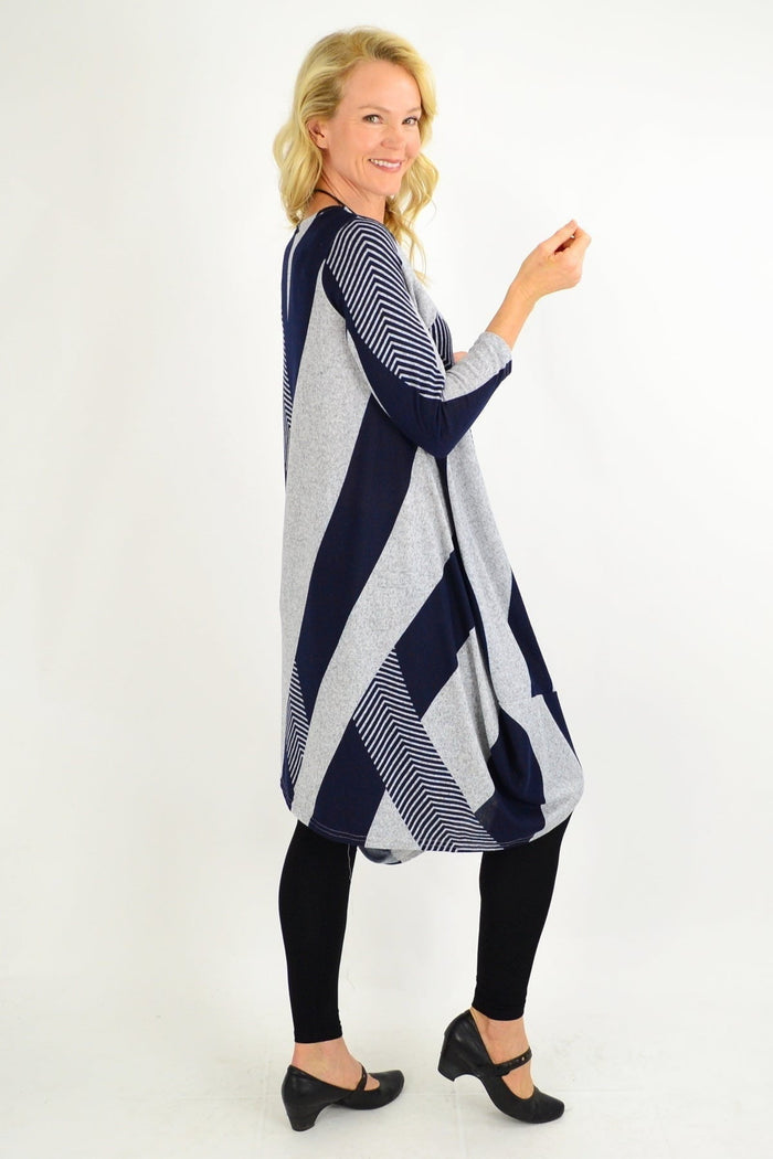 Navy and grey-blue woolen long tunic dress by Peony, featuring a relaxed fit and long sleeves, displayed on a mannequin.
