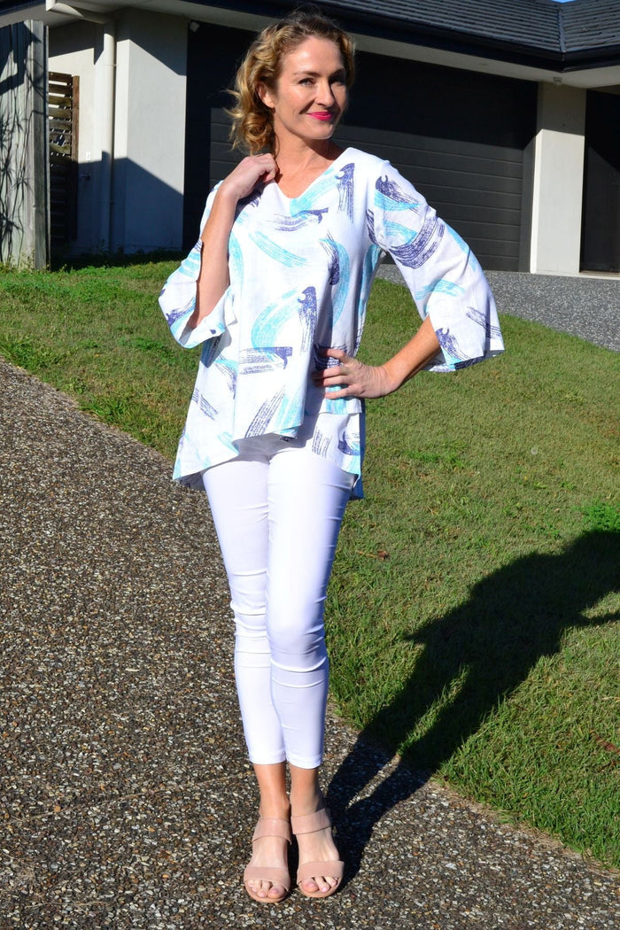 Ocean-colored linen and cotton tunic top by Ruby Rain featuring a relaxed fit and lightweight, breathable fabric.