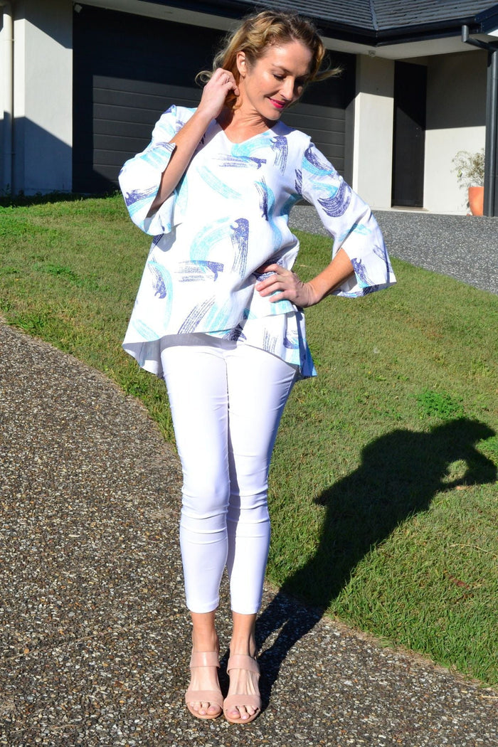 Ocean-colored linen cotton tunic top by Ruby Rain, featuring a relaxed fit with flowing fabric and casual style.